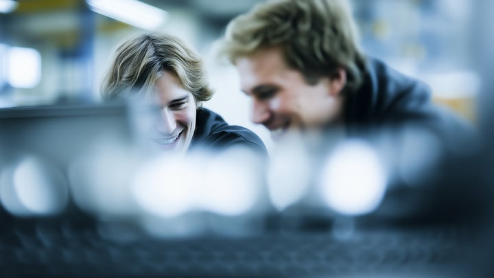 Two young co-workers in engineering careers.